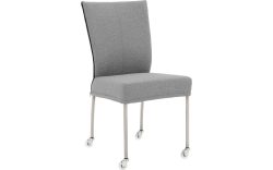 Goossens Eetkamerstoel Funk RVS Poten grijs stof leuning en met wielenTransparant skater wiel met rvs kap, modern design