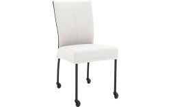 Goossens Eetkamerstoel Funk Zwarte Poten wit leer leuning en met wielenZwart skater wiel met zwarte kap, modern design
